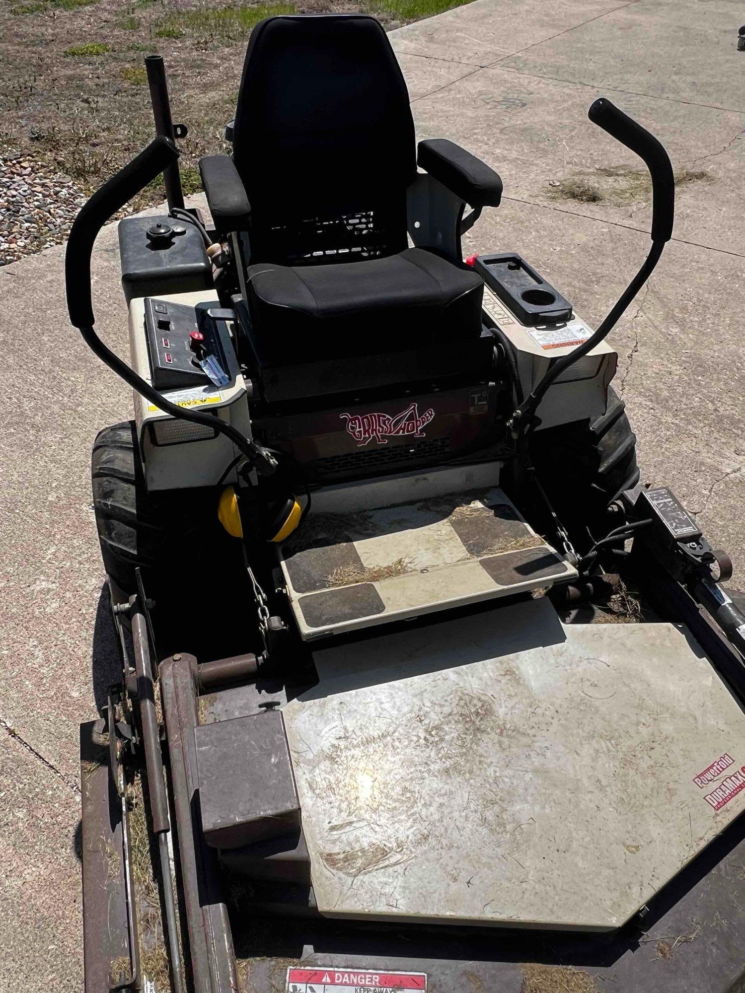 Grasshopper 727k zero turn with 61 inch deck and 887 hours runs and operates good