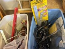 totes of belts, bungee cords, straps, and a miter mate