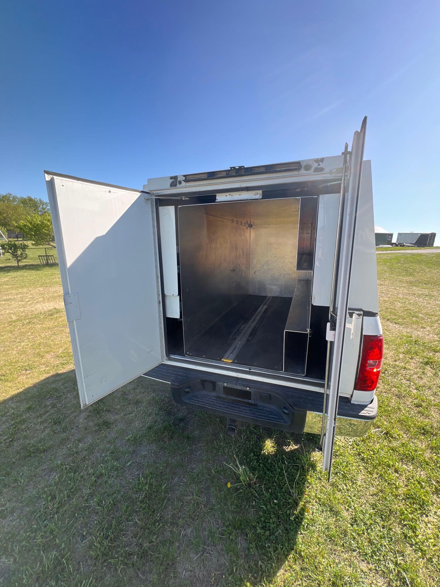 7619-2011 Chevy Silverado K1500 LTextended cab with 121k miles and topper with storage