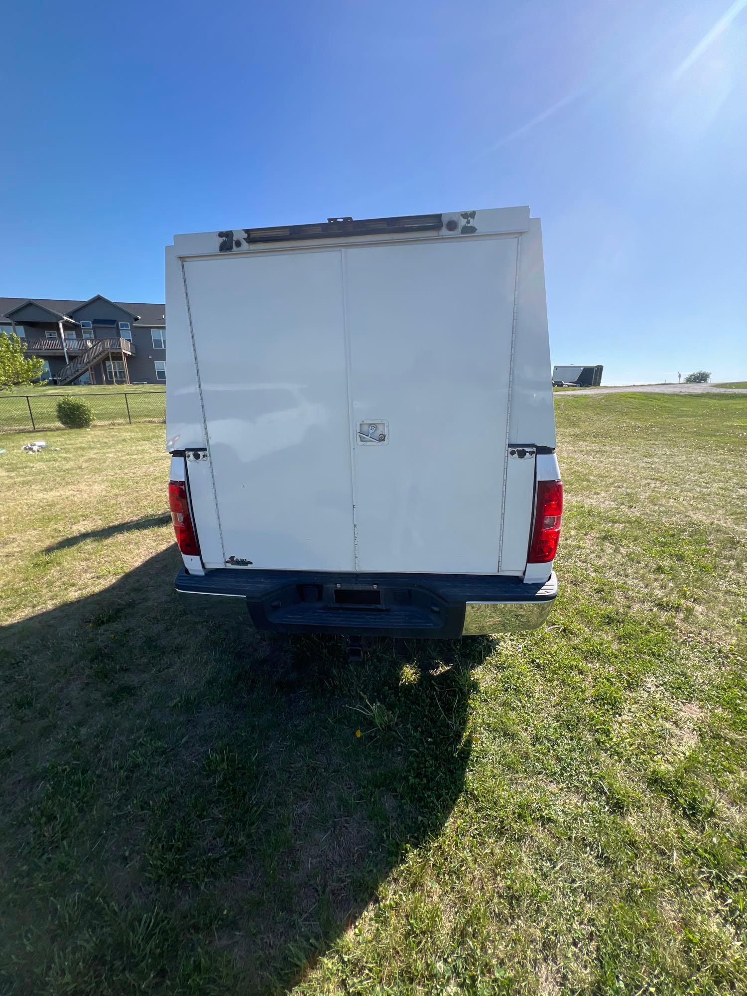 7619-2011 Chevy Silverado K1500 LTextended cab with 121k miles and topper with storage