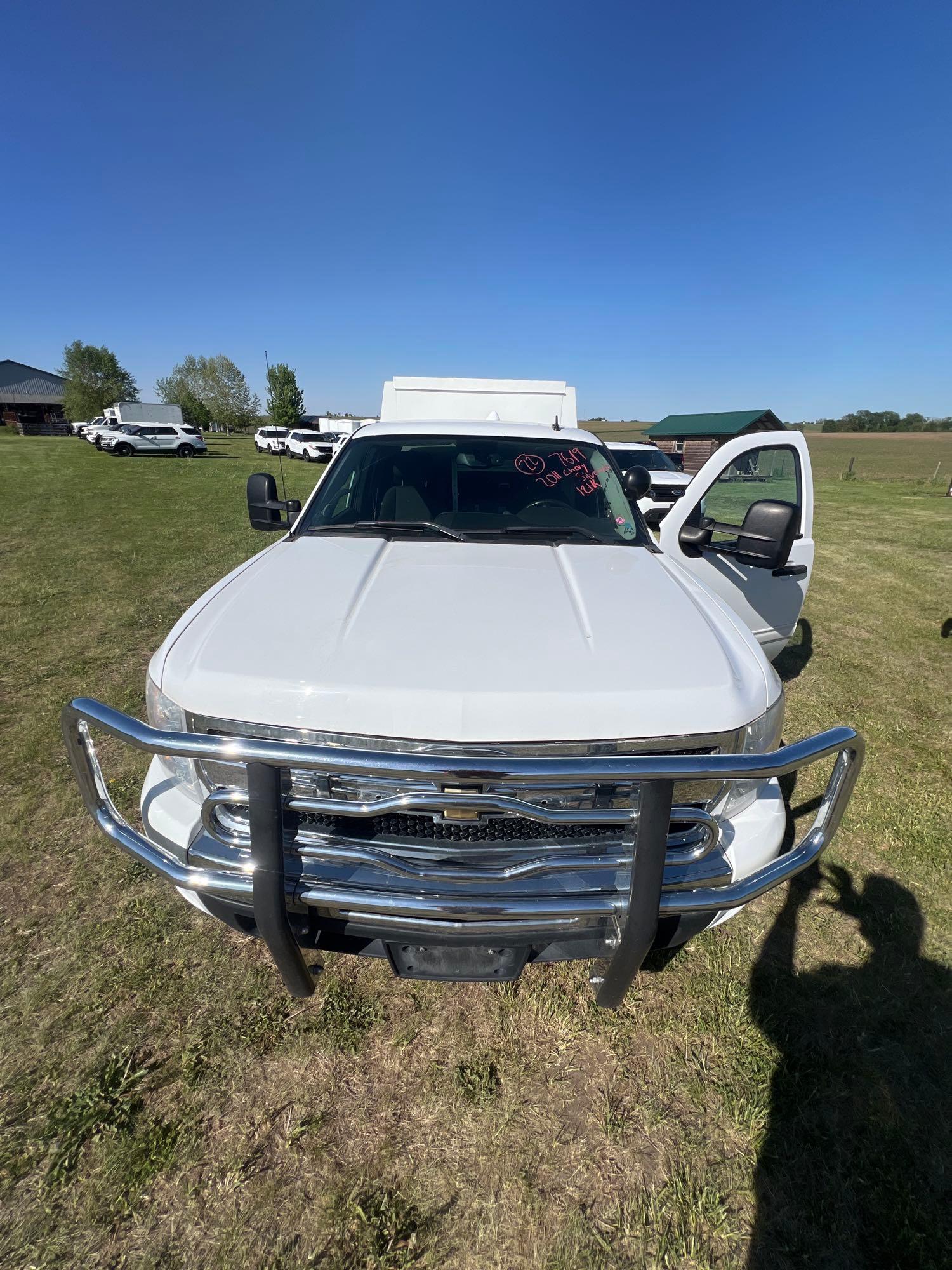 7619-2011 Chevy Silverado K1500 LTextended cab with 121k miles and topper with storage