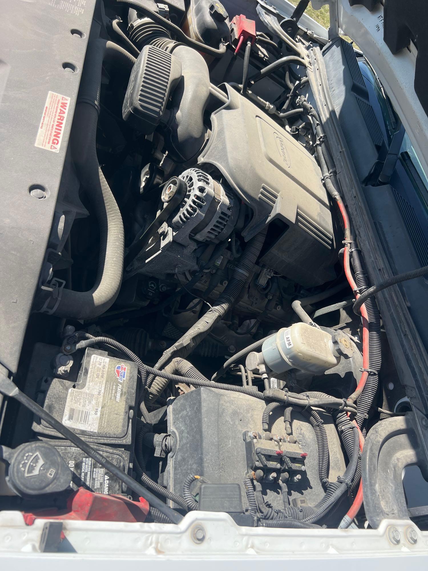 7619-2011 Chevy Silverado K1500 LTextended cab with 121k miles and topper with storage
