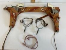 Toy pistols and spurs