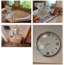 Master bathroom dresser with mirror AND bathroom decor- wall hangings, lamp, clock