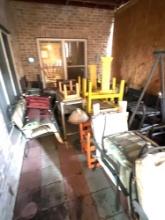 Patio full of lawn furniture and cast-iron and more!