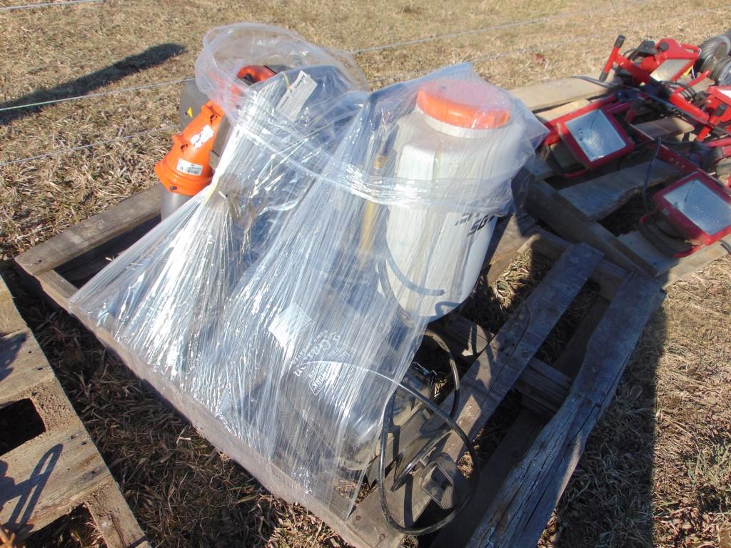 Pallet of lawn sprayers and backpack leaf blowers