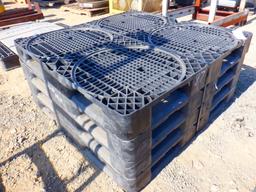 (4) Plastic Pallets.