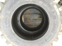(4) Unused SKS332 12-16.5 Skid Steer Tires.