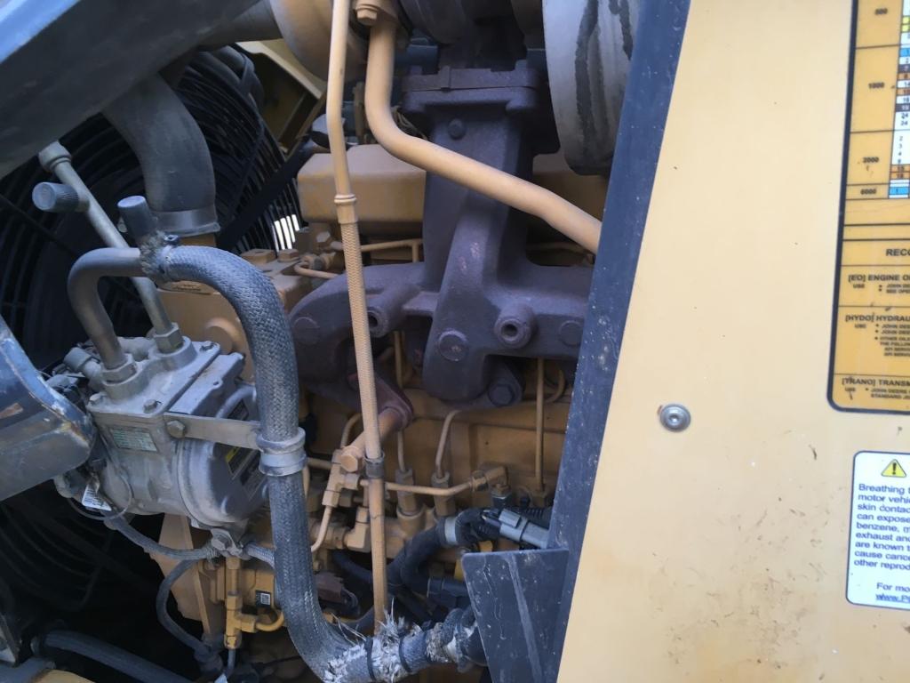 2010 John Deere 410J Backhoe,