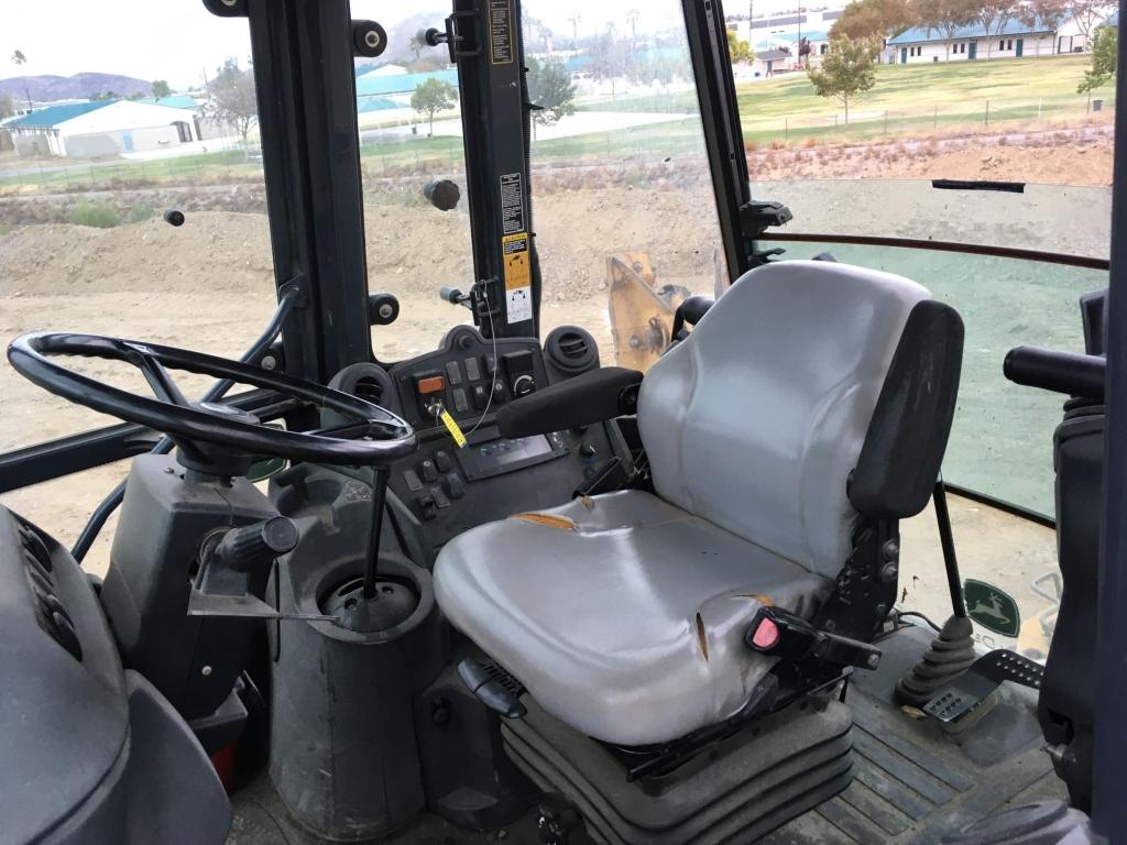 2010 John Deere 410J Backhoe,