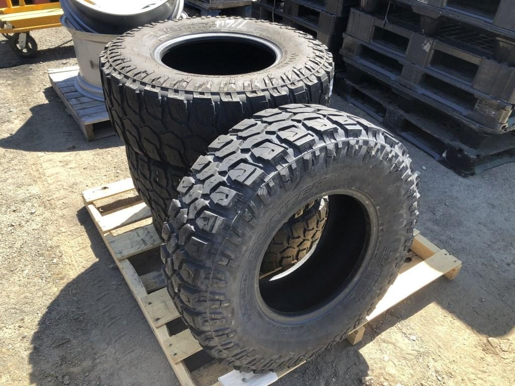 (4) Saferich Mud Hunter 31x10.05R15LT Tires.