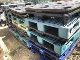 Stacks of Misc Plastic Pallets.