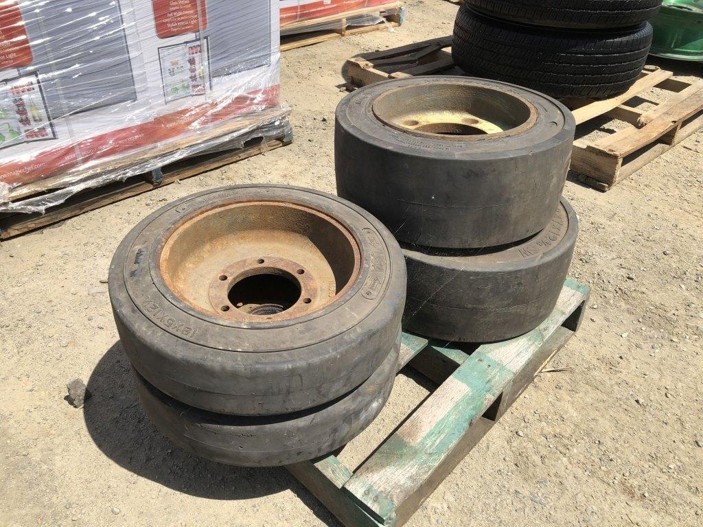 (2) 18x7x12 1/8 Solid Tires & Rims,