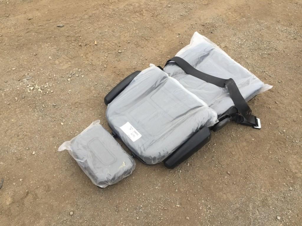 Unused Seat w/Arm Rests and Seat Belt.
