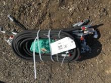 Bundle of Unused Hydraulic Hoses.