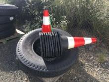 Stack of Safety Cones, and (2) West Lake Tires.