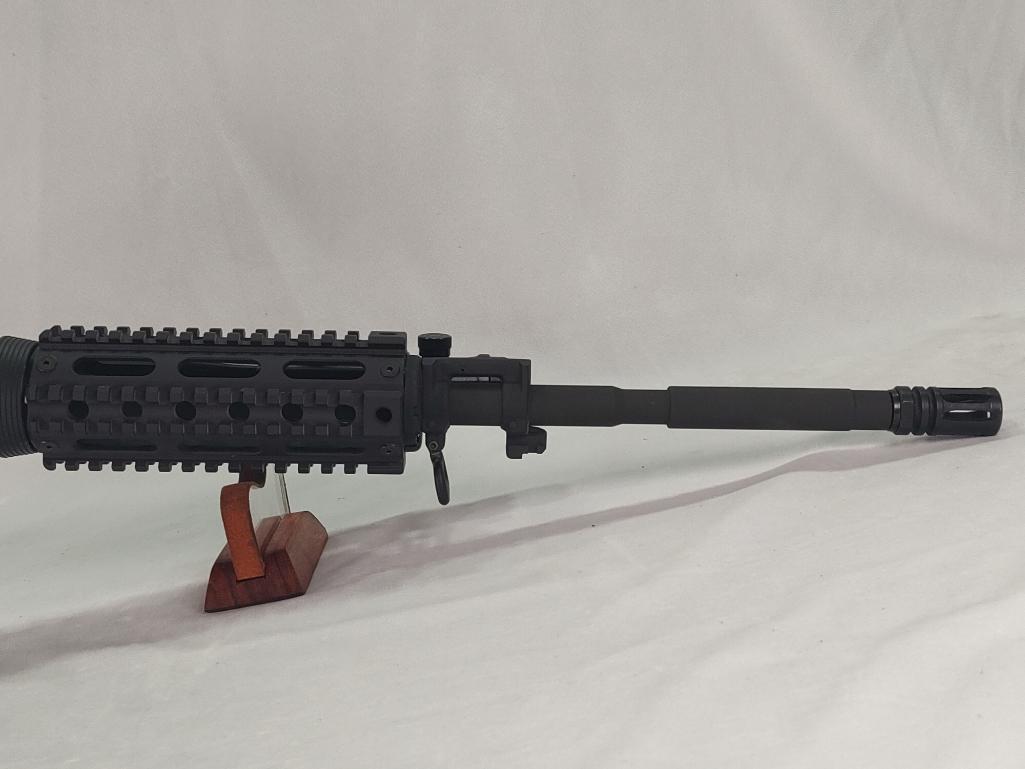 Bushmaster Model XM15-E2S, 223 Caliber Rifle with Weaver Scope
