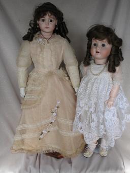 Four reproduction porcelain dolls:- Jumeau long face Bebe 43cm on compositi