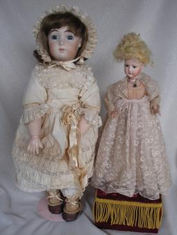 Four reproduction porcelain dolls:- Jumeau long face Bebe 43cm on compositi