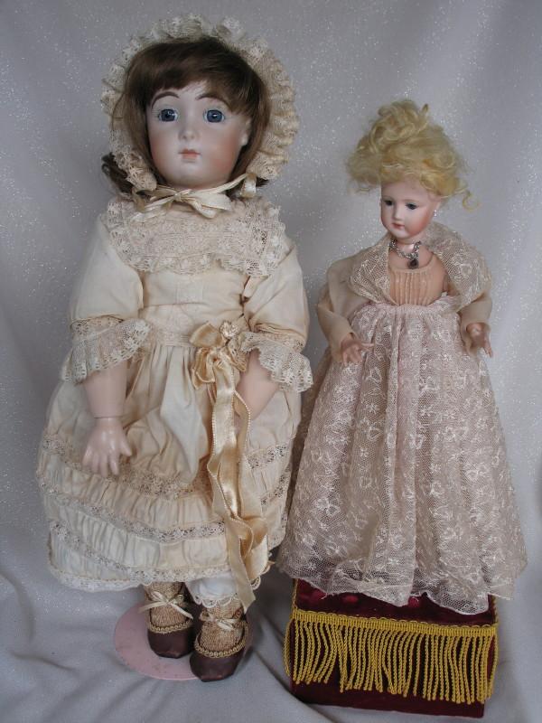 Four reproduction porcelain dolls:- Jumeau long face Bebe 43cm on compositi