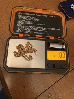TWO 14K GOLD CHAINS AND GOLD RINGS