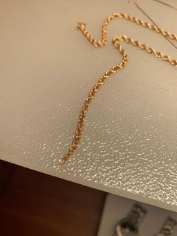 TWO 14K GOLD CHAINS AND GOLD RINGS