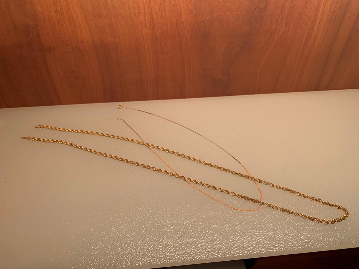 TWO 14K GOLD CHAINS AND GOLD RINGS