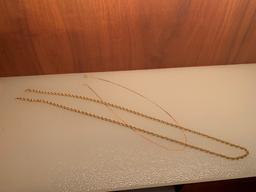TWO 14K GOLD CHAINS AND GOLD RINGS