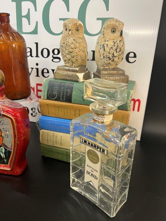 VINTAGE BOTTLES, BOOKS, AND OWL CHALKWARE BOOKENDS
