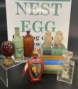 VINTAGE BOTTLES, BOOKS, AND OWL CHALKWARE BOOKENDS