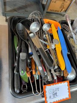 Juice Press, Plastic Tubs of Kitchen Utensils