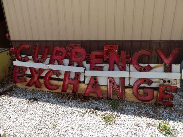 Neon Porc. Currency Exchange Sign