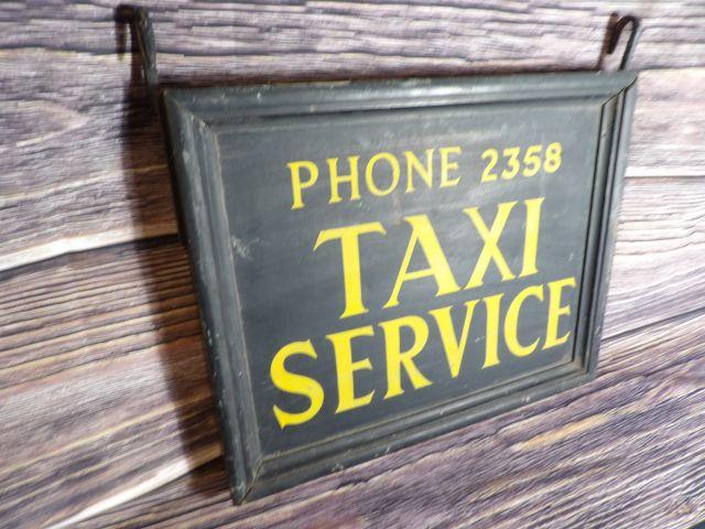 Early Wooden Taxi Service Sign