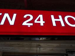 Lighted "Open 24 Hours" Sign