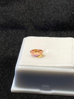 1.40CT AVG OVAL TRTD TWILIGHT MYSTIC TOPAZ