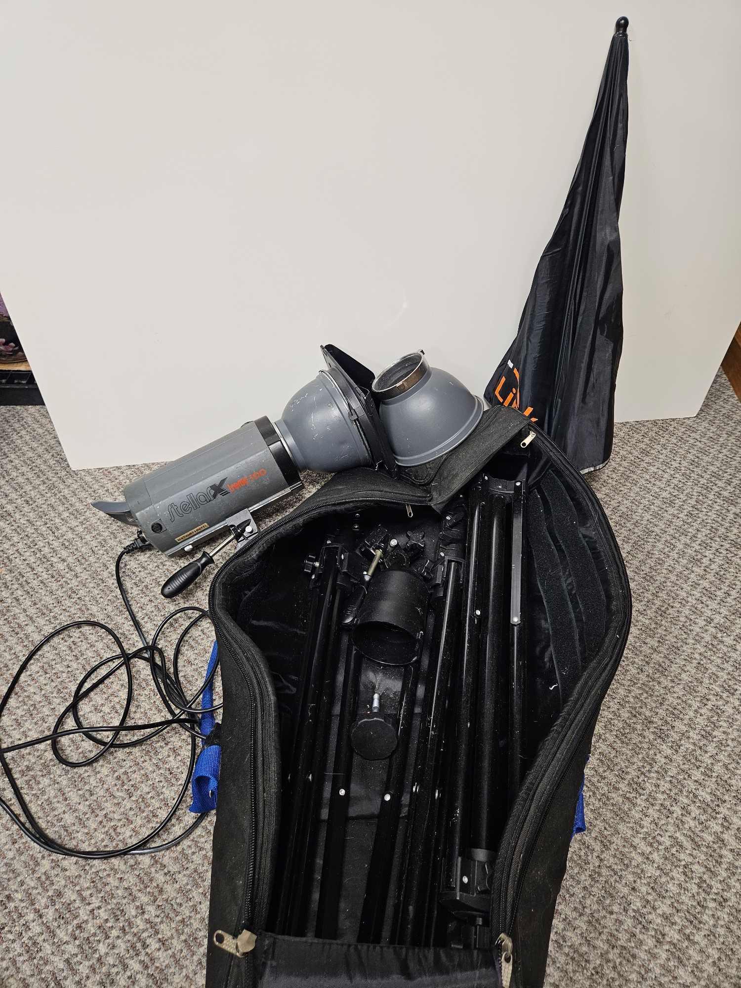 HUGE BAG OF INTERFIT STELLAR XTREME STUDIO LIGHTING WITH TRIPODS, UMBRELLA, AND BAG