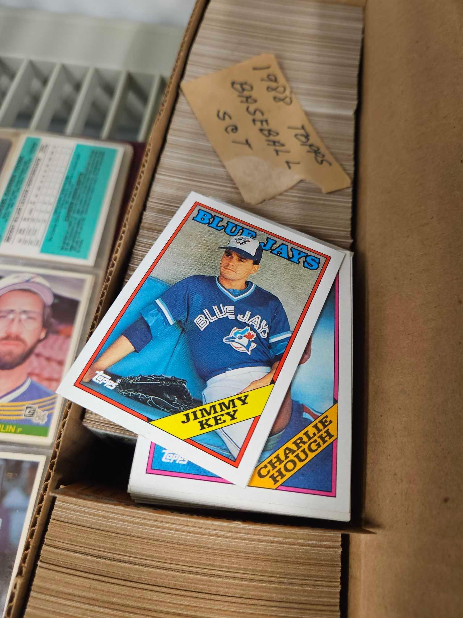Notebook and box of baseball sports memorabilia, collectible cards