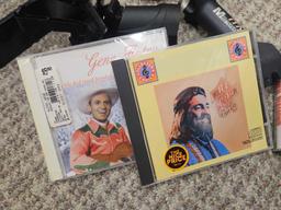 New sealed, willie nelson gene autry cds plus man stuff
