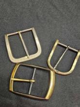 Vintage belt buckles including brass
