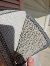 Area rug, clean. gray or light beige color