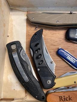 Cigar box with 8 pocket knives