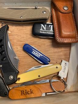 Cigar box with 8 pocket knives