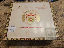 Cigar box with 8 pocket knives