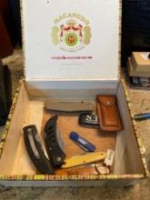 Cigar box with 8 pocket knives