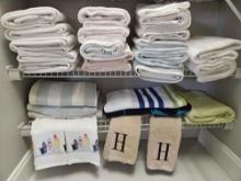 (2) Linen closet shelves of TOWELS including beach, H hand towels