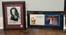 Framed autographed photos of Catherine Zeta Jones and Louie Anderson