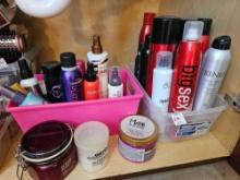 Two bins of hair products including big sexy, kenra, much more