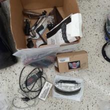 Lots of Harley Davidson Pieces and Parts including Screamin Eagle Super Tuner Pro, saddlebag face