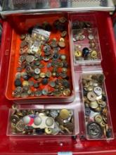 Collection of vintage and antique buttons, primarily made of metal