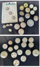 Vintage buttons, primarily white and clear varieties w intricate designs, rhinestones and molded